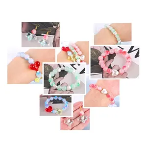 Variety of colorful jelly glass bead bracelets and earrings with romantic heart charms