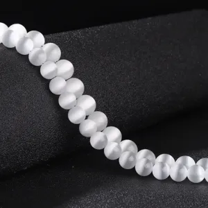 Elegantes cuentas redondas de piedra ojo de gato blanco para joyería hecha a mano