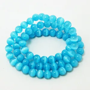 Cuentas redondas de ojo de gato azul para creación de joyas DIY y artesanía