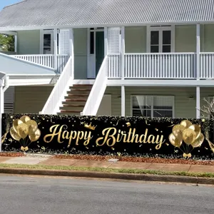 Large black and gold Happy Birthday banner for outdoor courtyard party decoration