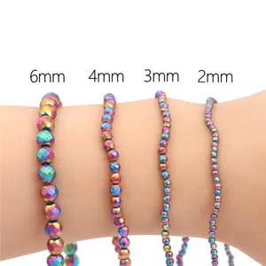 Close-up of iridescent hematite beads in 2mm, 3mm, 4mm, and 6mm sizes