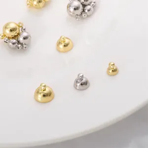 Macro detail of copper round magnetic ball clasps in gold and silver for DIY jewelry