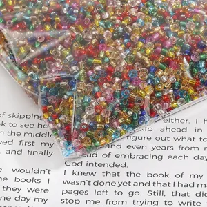 Macro detail of colorful silver-lined glass seed beads for DIY jewelry making