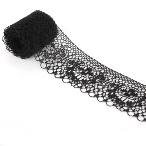 Macro view of 40mm black non-elastic lace ribbon showing delicate mesh pattern