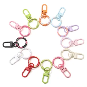Variety pack of colorful donut-shaped alloy spring clasps with polka dot patterns for DIY crafts