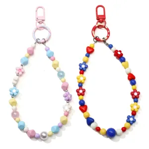 Detailed view of colorful handmade beaded phone straps with alloy spring clasps