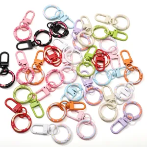 Detail shot of various colorful alloy donut spring buckles for DIY keychains and crafts