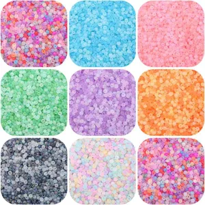 Macro detail showing nine sets of various colored frosted seed beads for jewelry DIY making