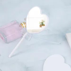 Cute heart-shaped lollipop handheld mirror for makeup and daily use in portable design