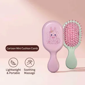 Macro view showing the details of the cute cartoon mini portable airbag hairbrush