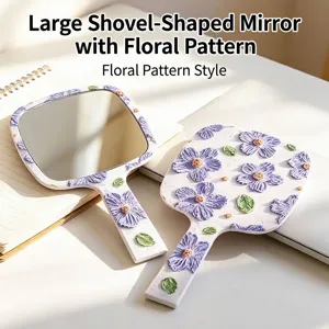 Large square handheld mirror with an elegant embossed purple floral pattern design