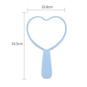 Süßer hellblauer herzförmiger Handspiegel mit Maßen von 16,5 cm Länge und 10,8 cm Breite