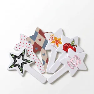 Stylish star-shaped handheld makeup mirrors featuring various cute and colorful prints