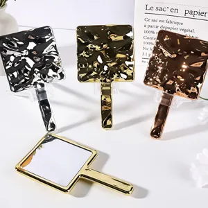 Handheld electroplated square mirrors with hammered texture back in gold and silver