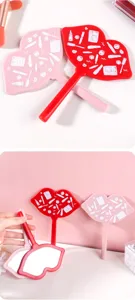 Lip-shaped handheld makeup mirrors in red and pink with cute white makeup patterns