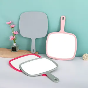Grote handmake-upspiegel met ergonomische ophanghandgreep in diverse pastelkleuren