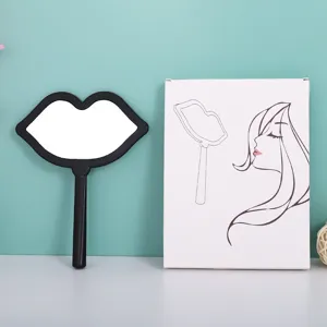 Lip-shaped handheld makeup mirror with decorative storage box and illustration