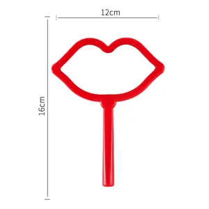 Red lip-shaped handheld makeup mirror with portable handle, measurements 12cm by 16cm