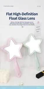 Detailed view of creative star-shaped handheld makeup mirrors in pastel pink and green