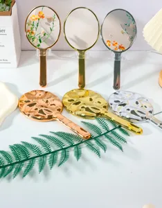 Elektroplattierte Handspiegel in Gold, Silber und Roségold mit gehämmerten Rückseiten.