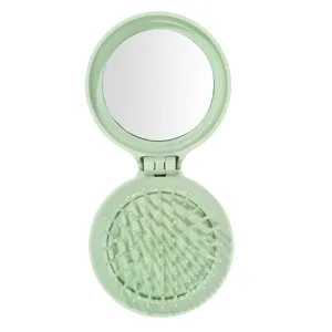 Compact mint green foldable hairbrush with massage bristles and integrated mirror