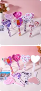 Collection of cute heart-shaped handheld mirrors featuring various cartoon patterns