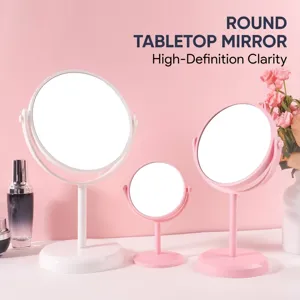 Minimalistische draaibare desktop make-upspiegels in wit en roze voor de kaptafel