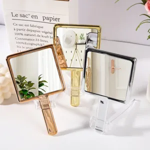 Set of three handheld square makeup mirrors with gold, rose gold, and silver finish