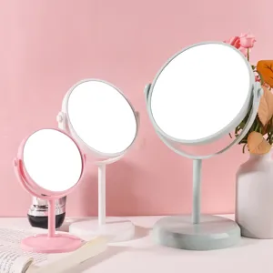 Set van drie draaibare make-upspiegels voor op bureau in roze, witte en groene kleuren