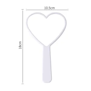 Portable small white heart-shaped handheld makeup mirror with dimensions 18cm by 10.5cm