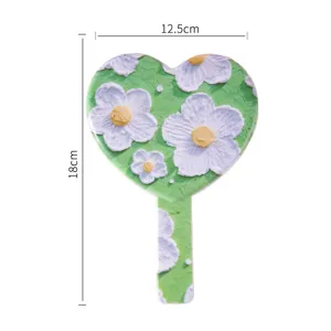 Heart-shaped handheld mirror with floral oil painting style design, 12.5x18cm size.