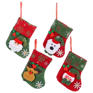 Set of 4 festive Christmas mini stockings with Santa, bear, reindeer, and snowman designs.