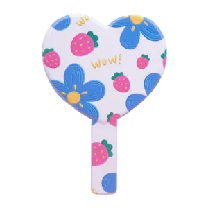 Cute heart-shaped handheld vanity mirror with strawberry and blue flower patterns