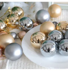 Close-up detail of assorted metallic gold, silver and matte finish Christmas ornament balls