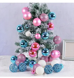 Vibrant assorted Christmas ball ornaments displayed on a snowy tree background