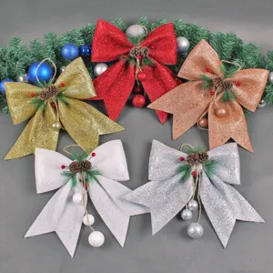 Set di cinque fiocchi natalizi glitterati con pigne e bacche per decorare l'albero.