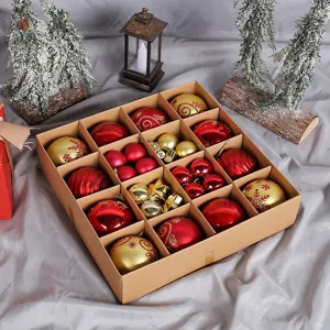 Red and gold Christmas ball ornament set in a kraft box with festive decorations