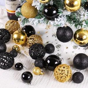 Elegant black and gold Christmas ball ornaments set featuring glitter and matte finishes