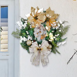 Elegant luminous golden Christmas wreath featuring a lantern and Nativity scene figures