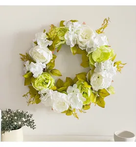 Detailed view of an elegant white and green peony hydrangea artificial floral wreath