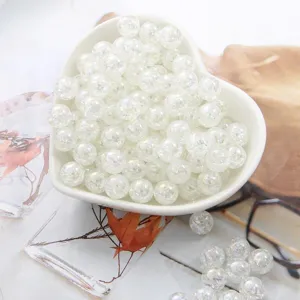 Detailed macro shot of white AB acrylic crackle bubble beads for DIY bracelet making