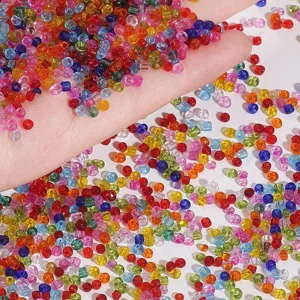 Close-up of vibrant multi-color glass seed beads for DIY jewelry and embroidery crafts.