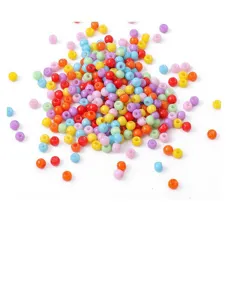 Macro view of 4mm assorted colorful opaque glass seed beads for DIY jewelry making.