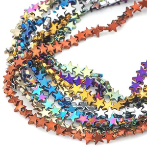 Macro view of iridescent star-shaped plated hematite beads for DIY jewelry making