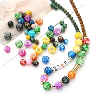 Detailed view of colorful acrylic beads and alphabet beads for DIY jewelry making