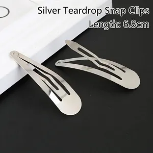 Detail van zilveren druppel haarspeldjes van 6,8 cm voor DIY haaraccessoires.
