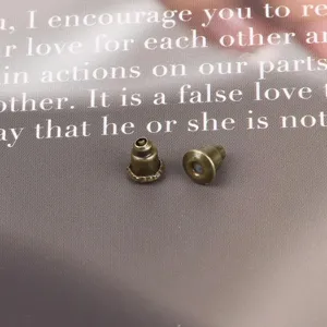 Pair of antique bronze earring backs with silicone inserts for DIY jewelry making and repair