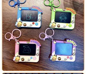 Detailed view of four colorful mini cartoon bee doodle board keychains on wood
