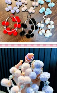 Detail view of plush pom-pom beaded phone chain in various colors and hand-held close-up.