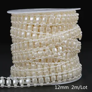 Close-up of cream square and round ABS pearl bead chain for DIY wedding decor